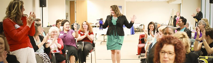 Rebecca Hall Gruyter presenting to an audience